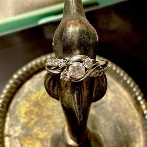 14k white gold and diamond halo ring